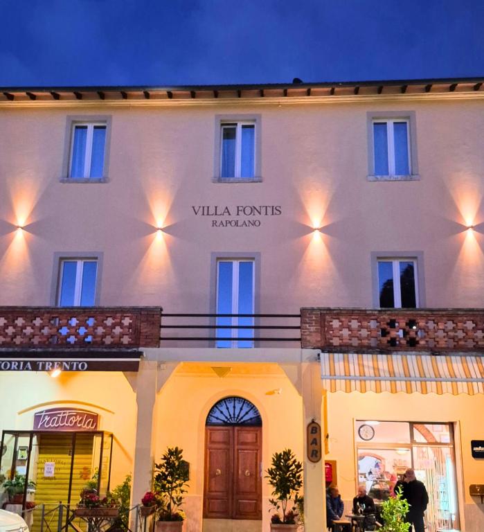 a building with a sign that reads villa fountains realized at Villa Fontis Rapolano in Rapolano Terme