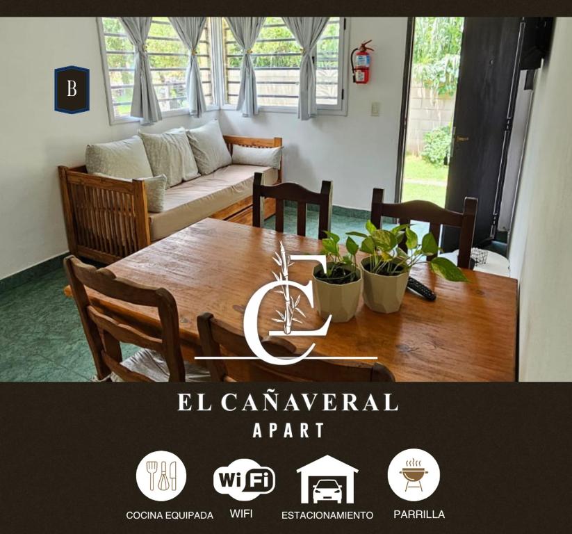 a living room with a wooden table and a couch at El Cañaveral in Capilla del Monte