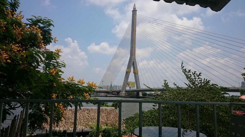 فضای داخلی New Phiman Riverview Guesthouse در بانکوک - تصویر ۳