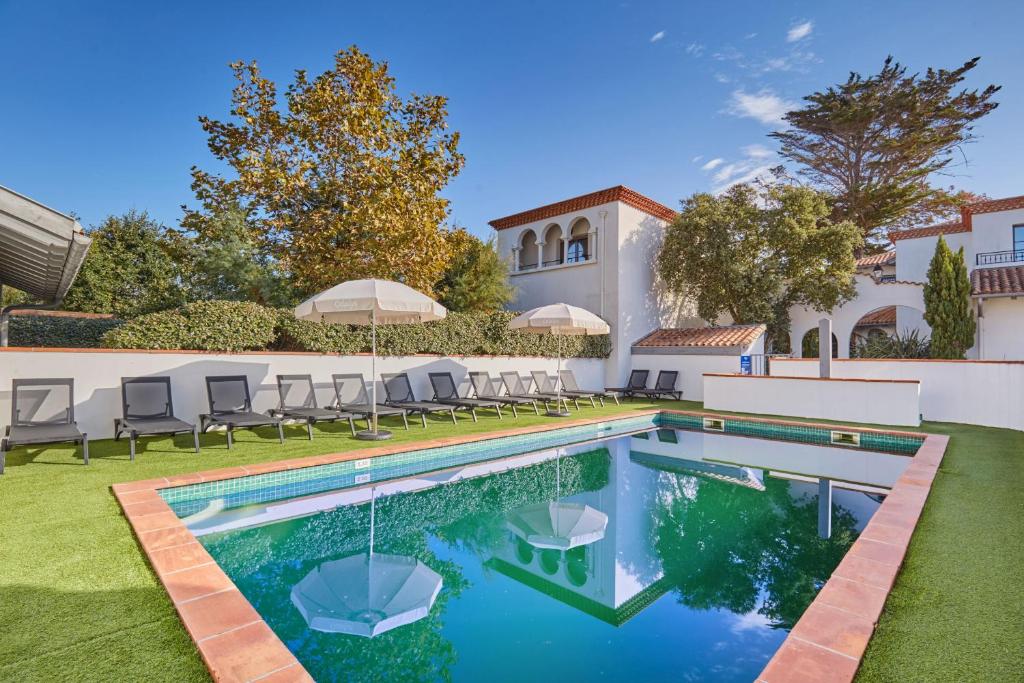 Swimmingpoolen hos eller tæt på Villas L Orée de Milady