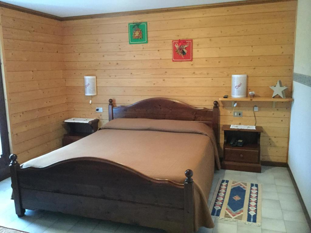 Postel nebo postele na pokoji v ubytování Albergo Ciori