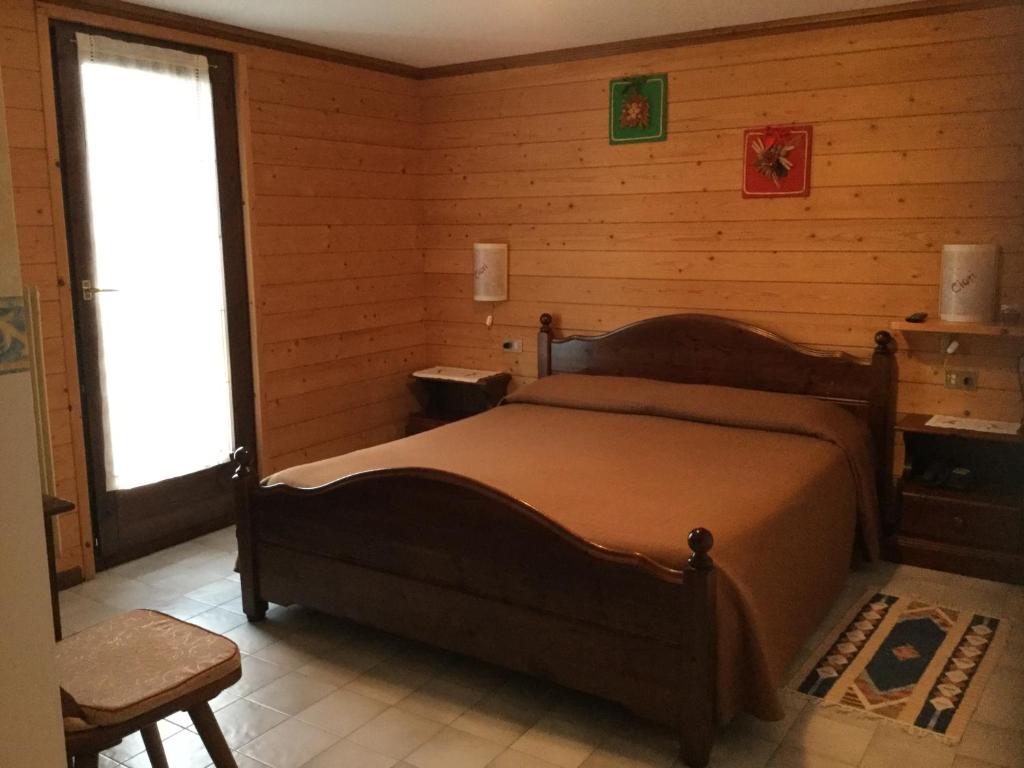 Postel nebo postele na pokoji v ubytování Albergo Ciori