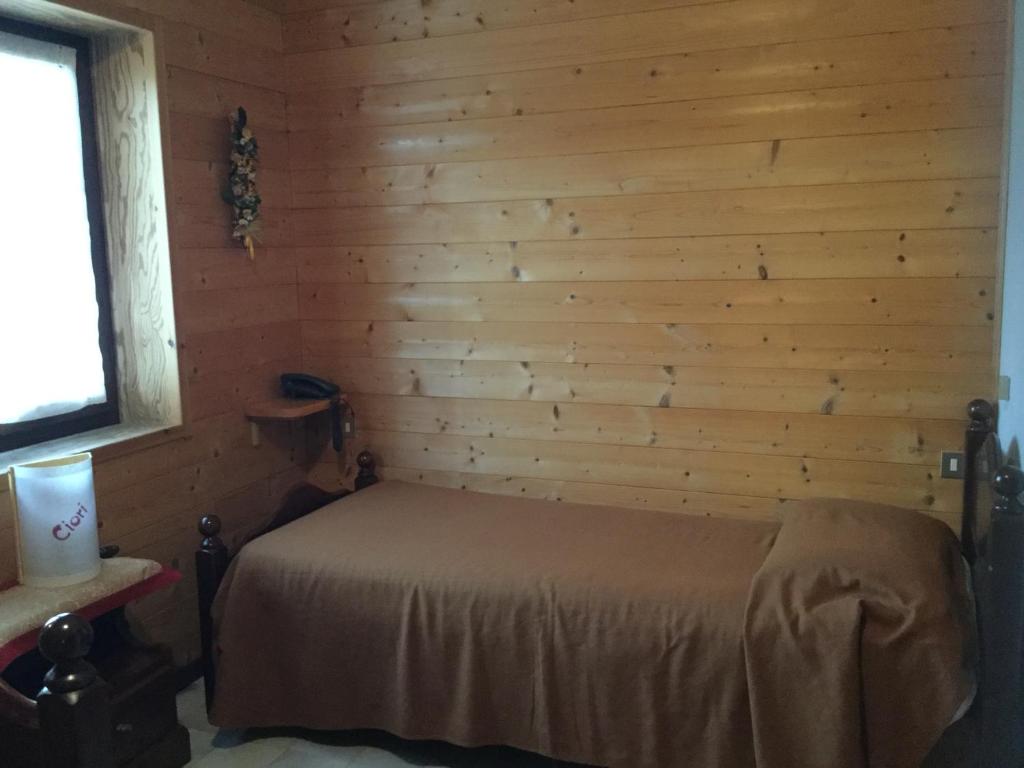 Postel nebo postele na pokoji v ubytování Albergo Ciori
