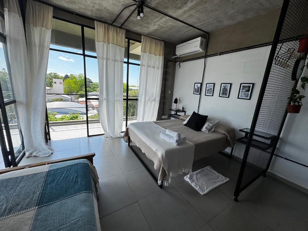 Postel nebo postele na pokoji v ubytování Loft en zona campus UNNE