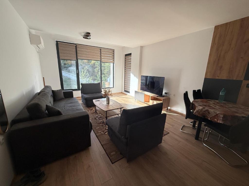 TV a/nebo společenská místnost v ubytování Nikol5 Deluxe