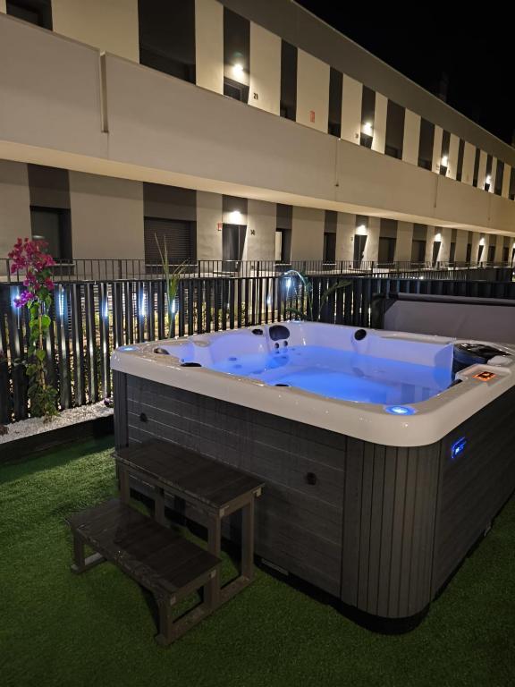 a large jacuzzi tub in a building at Iconic Zuza in Gran Alacant