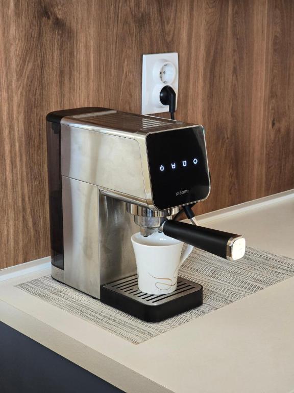 a coffee machine sitting on top of a counter at Kingston in Pirot