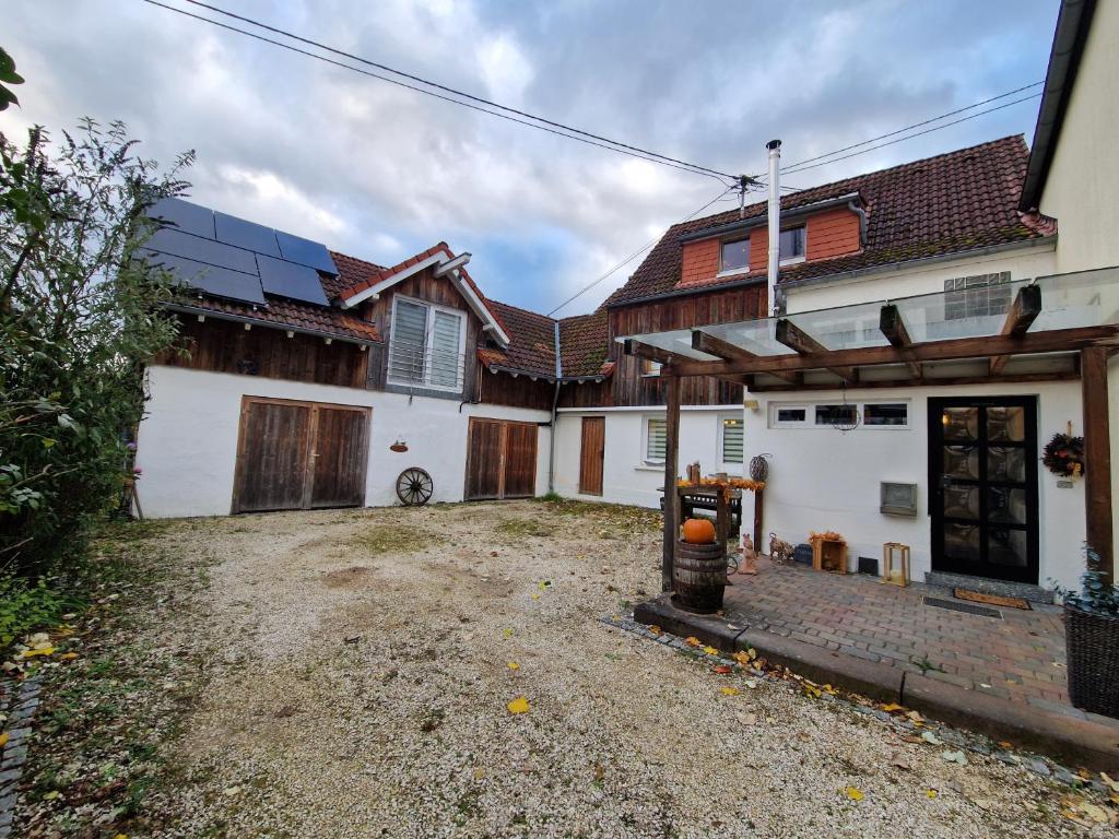 a group of houses with solar panels on them at Haus Fuchsbau, Familienzeit und Fokus im Grünen in Kurtscheid