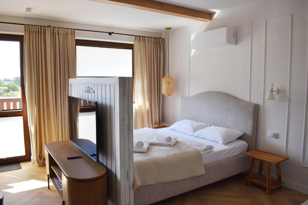 Postel nebo postele na pokoji v ubytování Wino&Grono Nałęczów