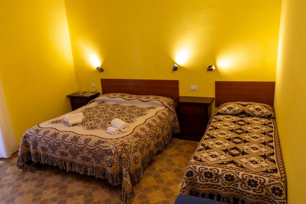 A casa dei miei - Habitación Triple Con Baño Compartido