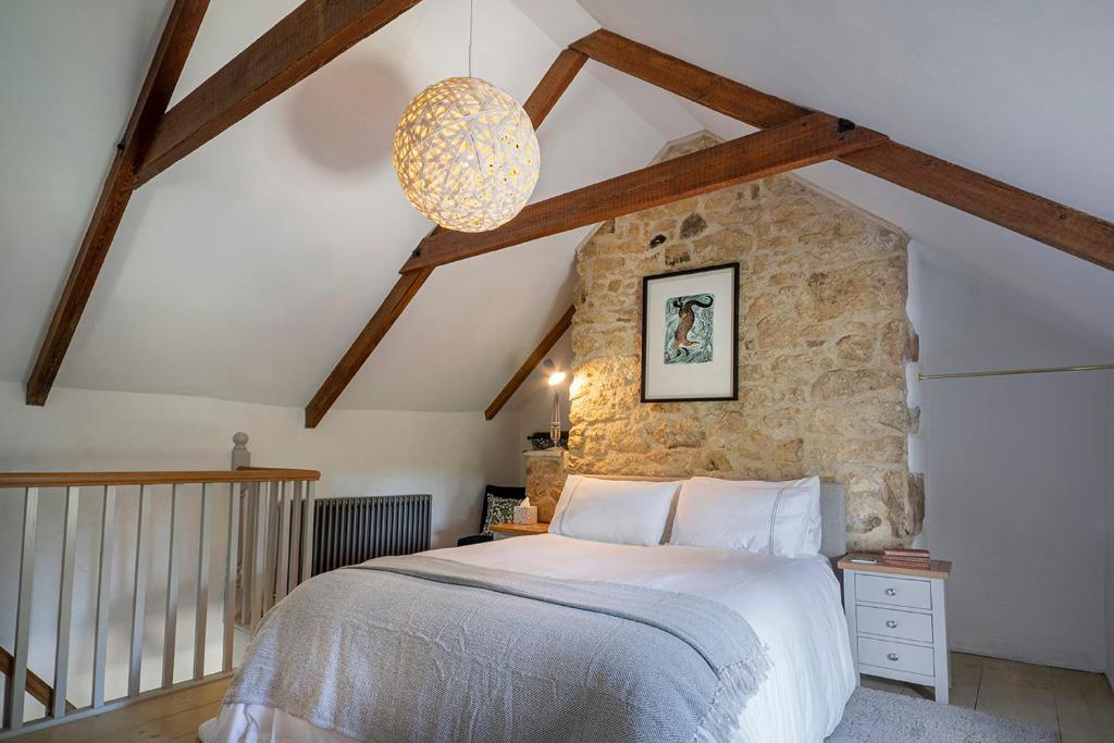 Voodi või voodid majutusasutuse Manor Cottage at Cusgarne Manor adults only toas