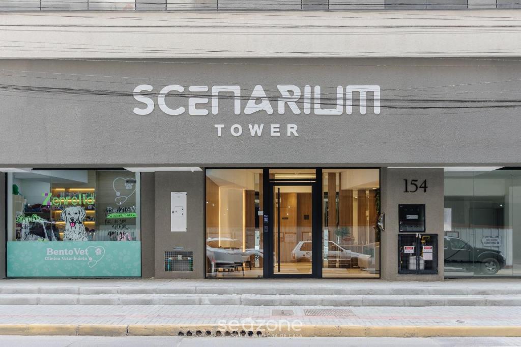 a store front with the name of a furniture store at Estadia completa a 500m do mar em Itapema - STWs in Meia Praia