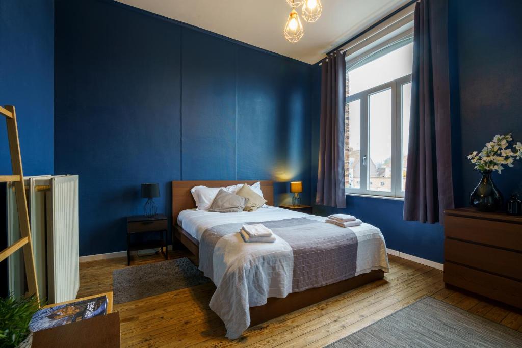 Postel nebo postele na pokoji v ubytování The Canal View Suites