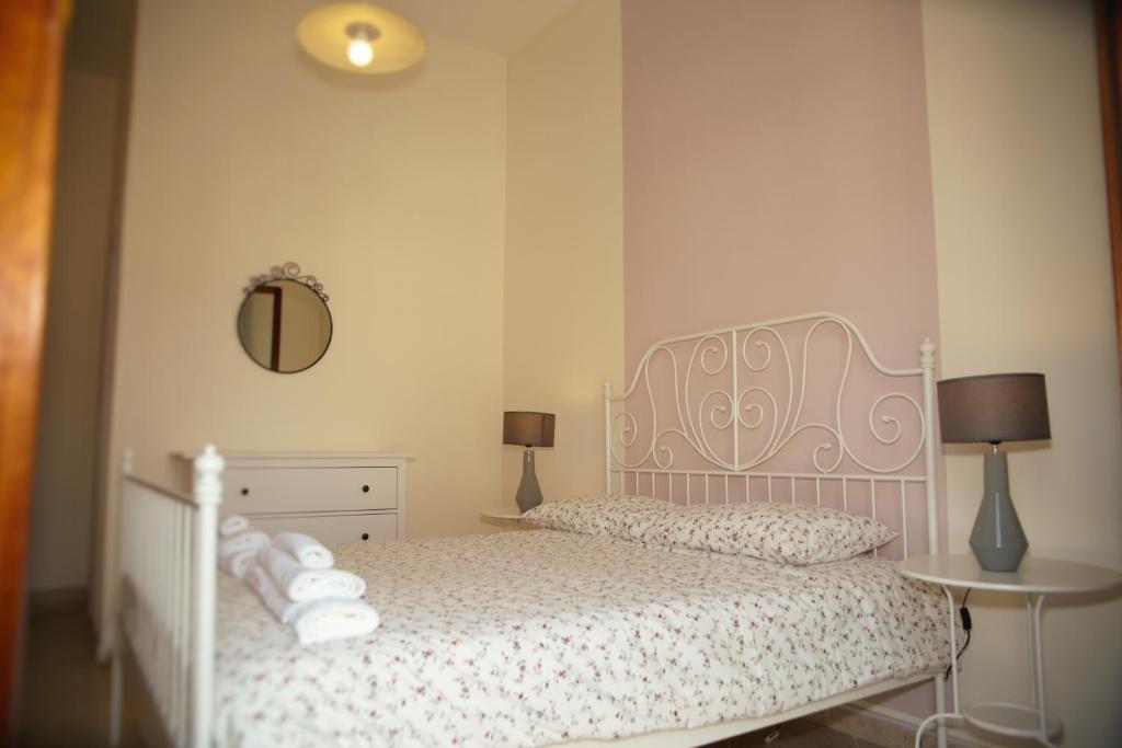 Postel nebo postele na pokoji v ubytování BnB DonnaLaura