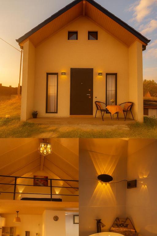 a house with a table and chairs in front of it at temo in Samgori