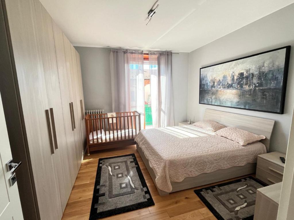 Postel nebo postele na pokoji v ubytování Magnifico Roero Relax Tre Camere