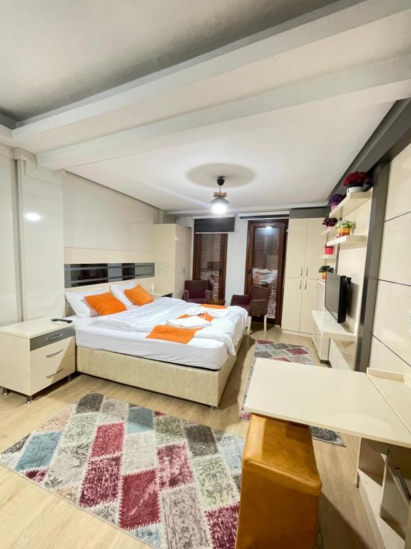 Ένα ή περισσότερα κρεβάτια σε δωμάτιο στο Taksim Premium Gold hotel