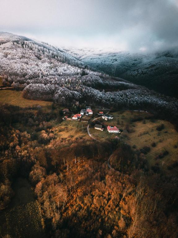 an aerial view of a village on a hill at Sad u Harušťákov in Lubina
