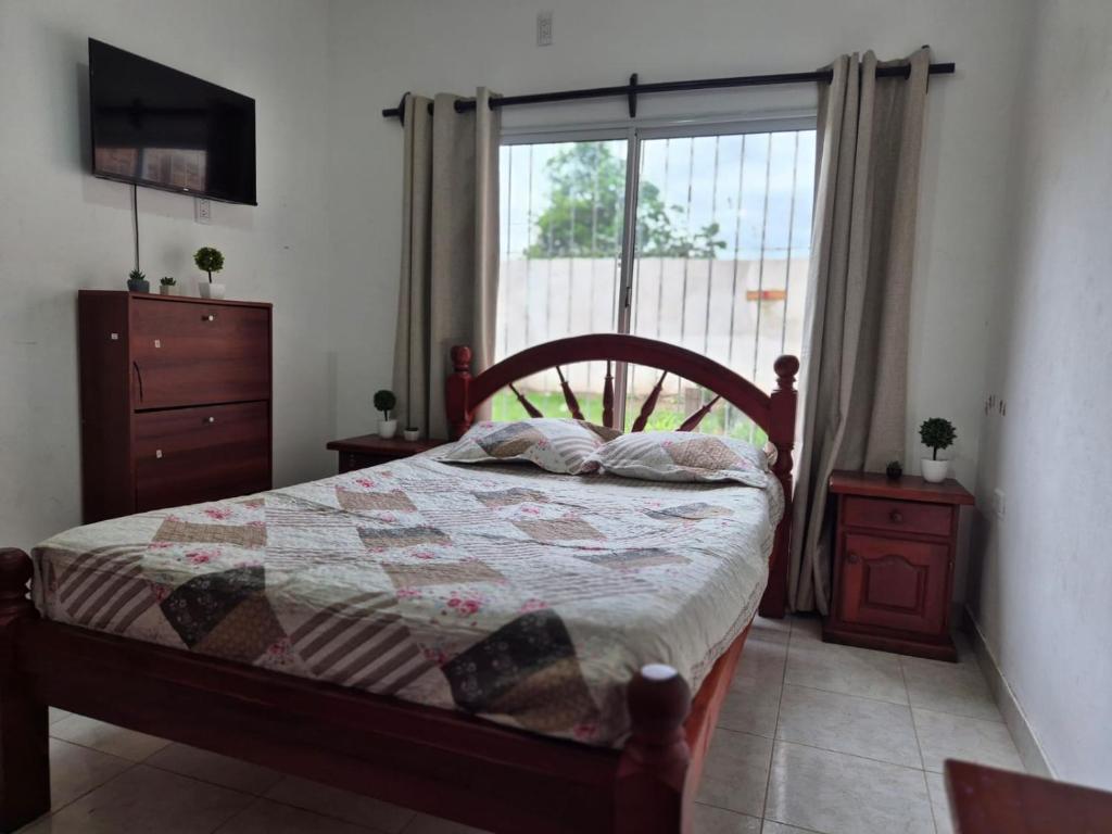 Giường trong phòng chung tại La Margara Salta