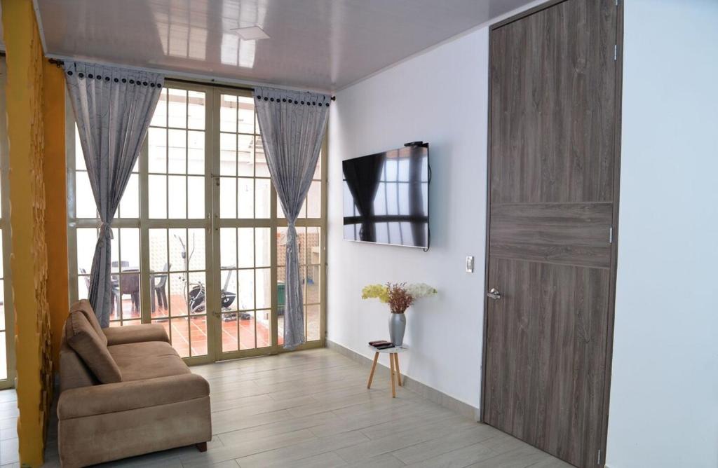 Χώρος καθιστικού στο Casa Completa con parqueadero privado capacidad de hasta 8 personas