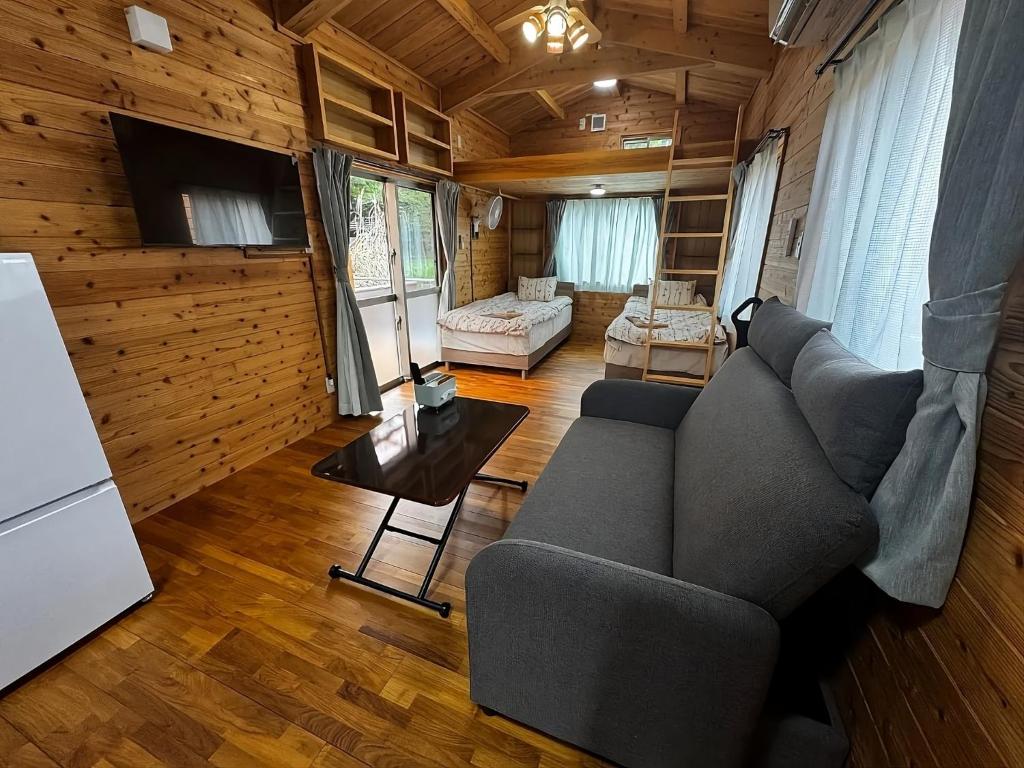 an overhead view of a living room with a couch and a tv at La prima stella - Vacation STAY 54161v in Nakasone