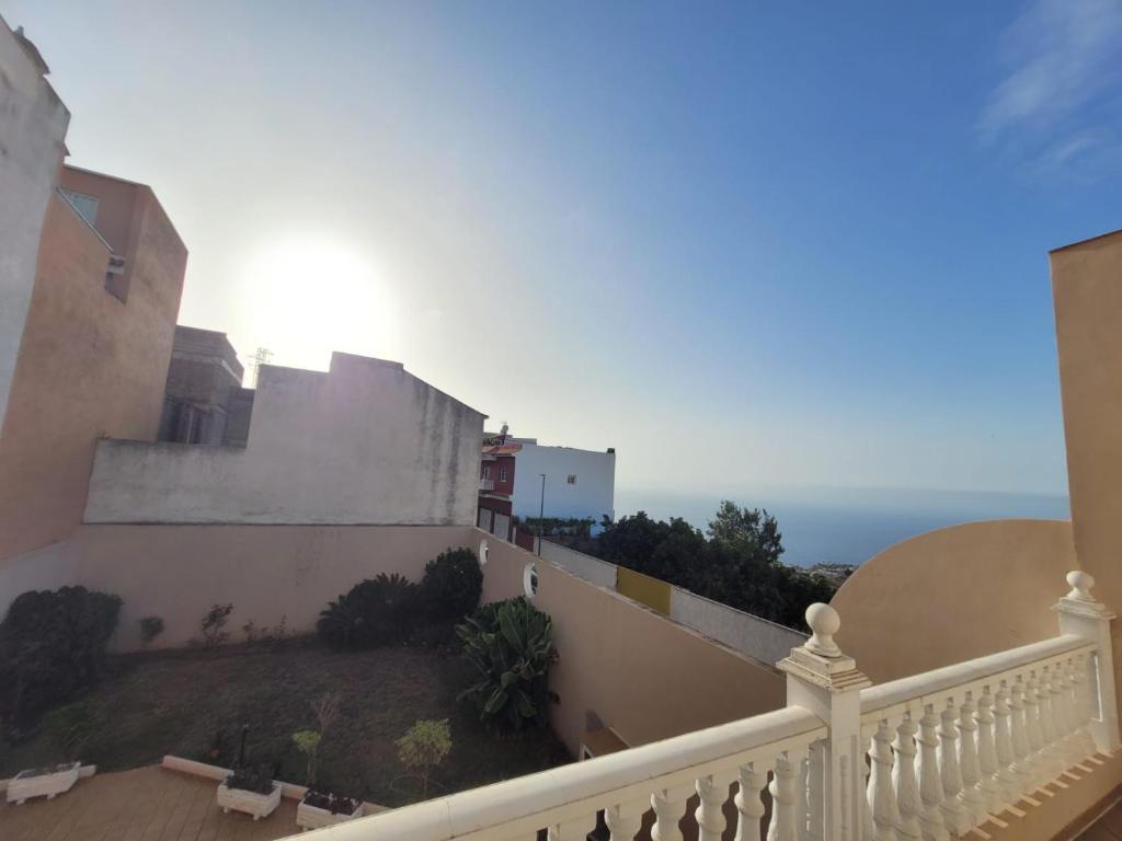 a balcony of a building with the ocean in the background at Casa Adora in Santa Ursula im Norden Teneriffas in Santa Úrsula