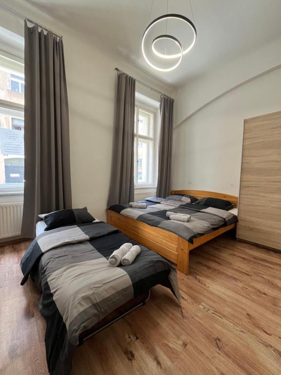 Ένα ή περισσότερα κρεβάτια σε δωμάτιο στο MIVA apartments