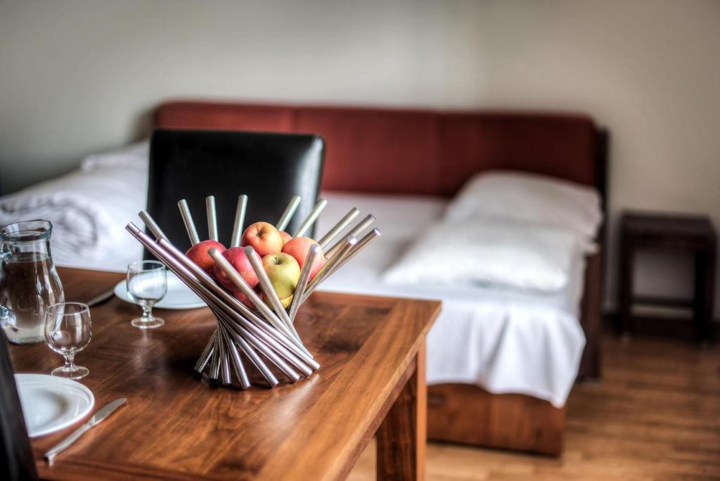 Postel nebo postele na pokoji v ubytování Comfort Aparthotel Lourdes L'Acacia