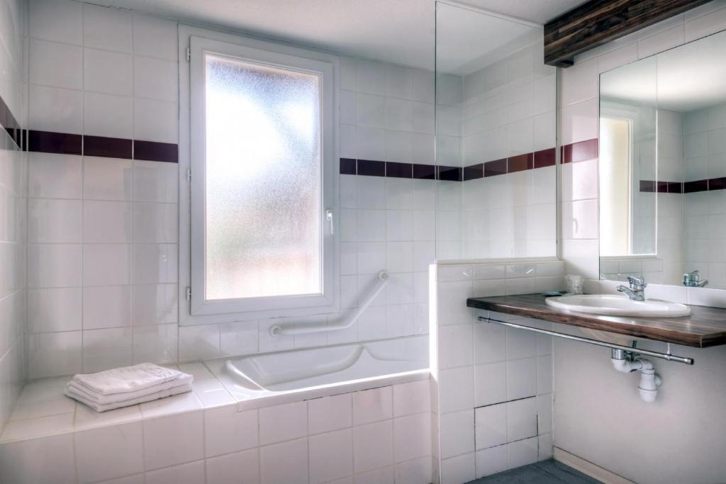 Koupelna v ubytování Comfort Aparthotel Lourdes L'Acacia