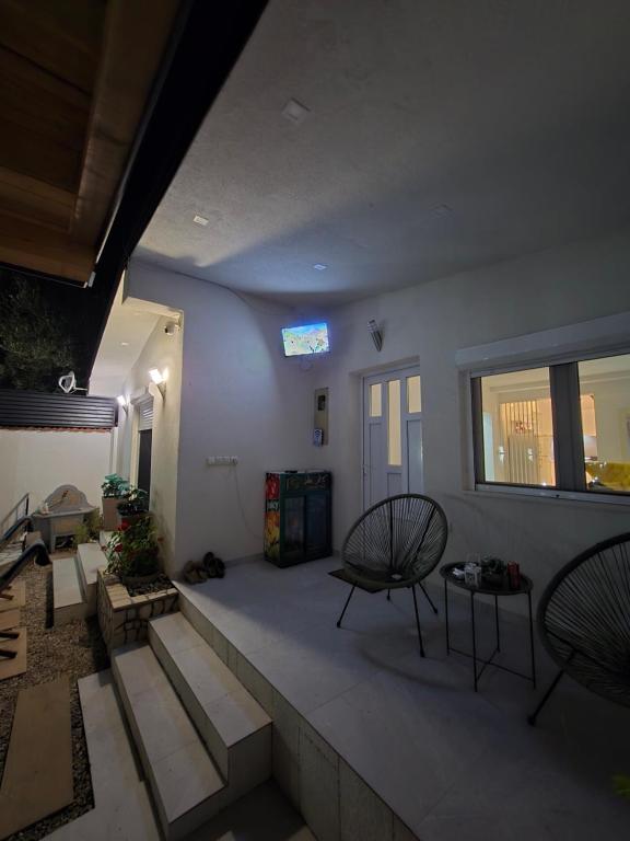 TV a/nebo společenská místnost v ubytování Apartman Majdan