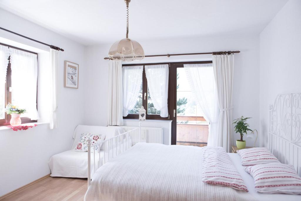 Giường trong phòng chung tại Ferienhaus Sara