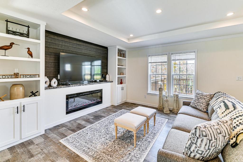 a living room with a couch and a fireplace at 8 Mi to Jiminy Peak Resort Mtn-View Home with Deck in Stephentown