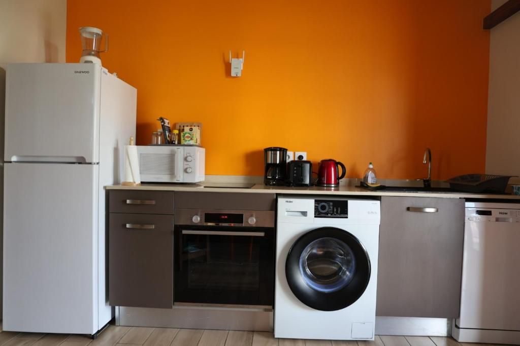 Kuchyň nebo kuchyňský kout v ubytování Bungalow Kaz Orchidée Oncidium