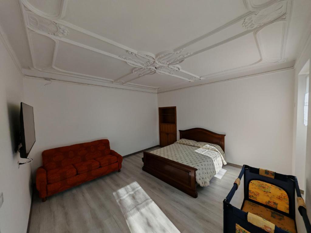 Postel nebo postele na pokoji v ubytování Dimora Dei Tre Raggi