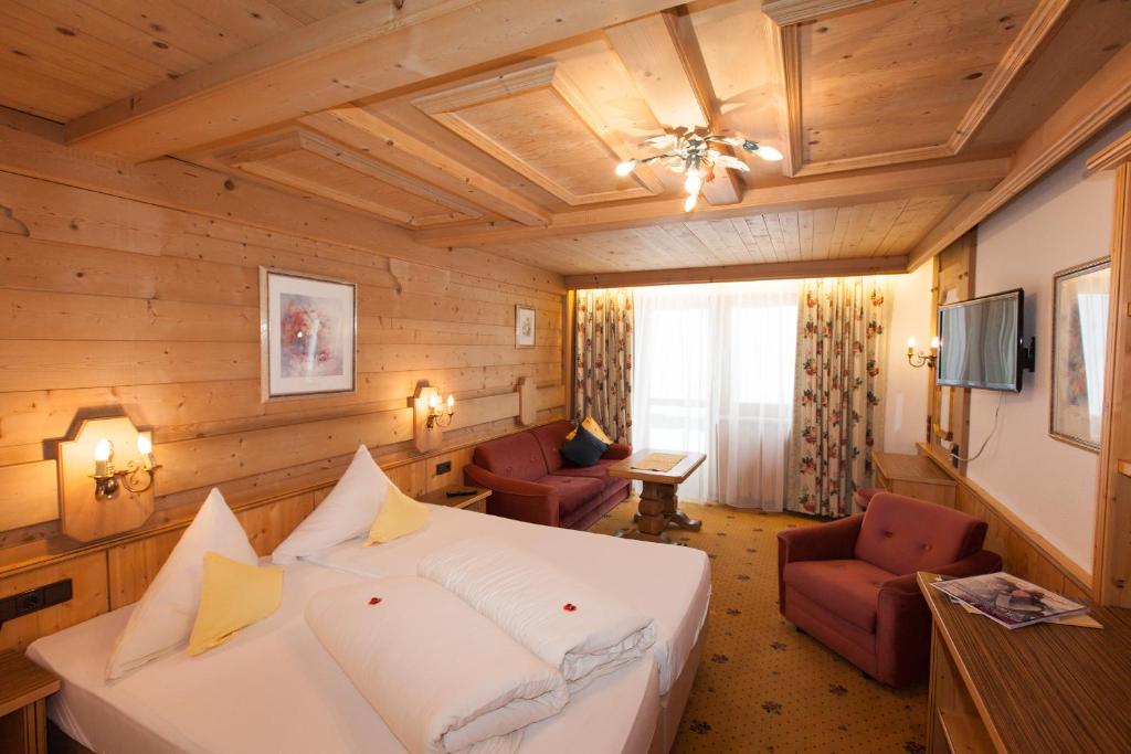 Postel nebo postele na pokoji v ubytování Hotel Schlosshof