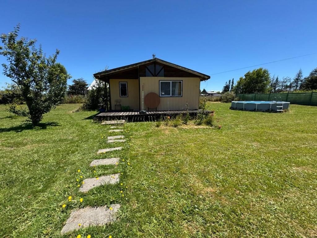 Aed väljaspool majutusasutust Cabaña en Frutillar, 2 dormitorios para 4 personas