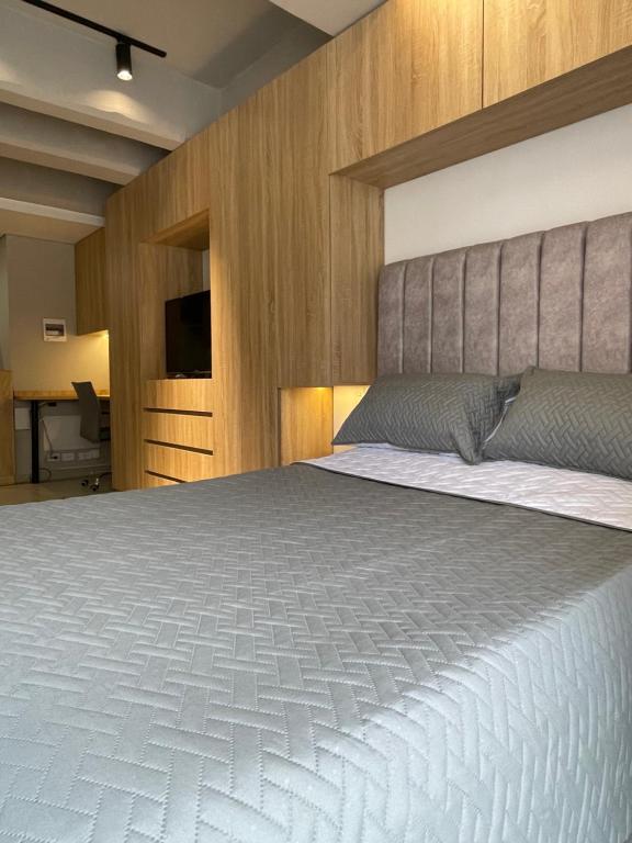 Postel nebo postele na pokoji v ubytování Moderno apartamento en North Point estudio 2