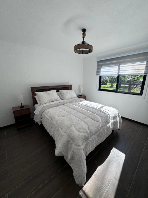 Ένα ή περισσότερα κρεβάτια σε δωμάτιο στο Termas del vino