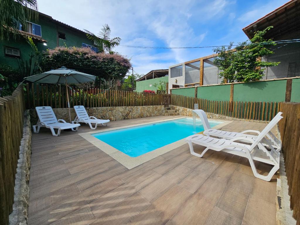 Kolam renang di atau dekat dengan Flat aconchegante próximo à Trindade e Paraty