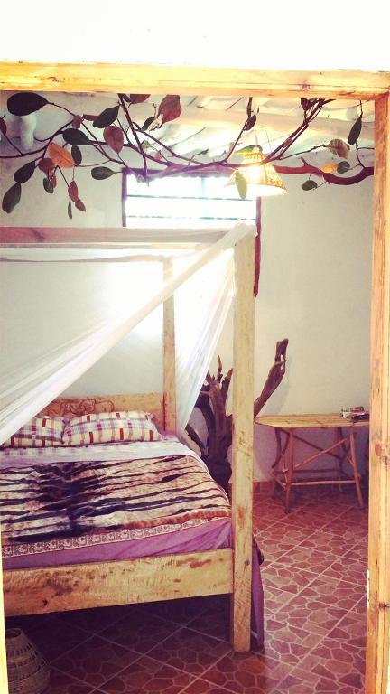 Postel nebo postele na pokoji v ubytování Diani Hostel