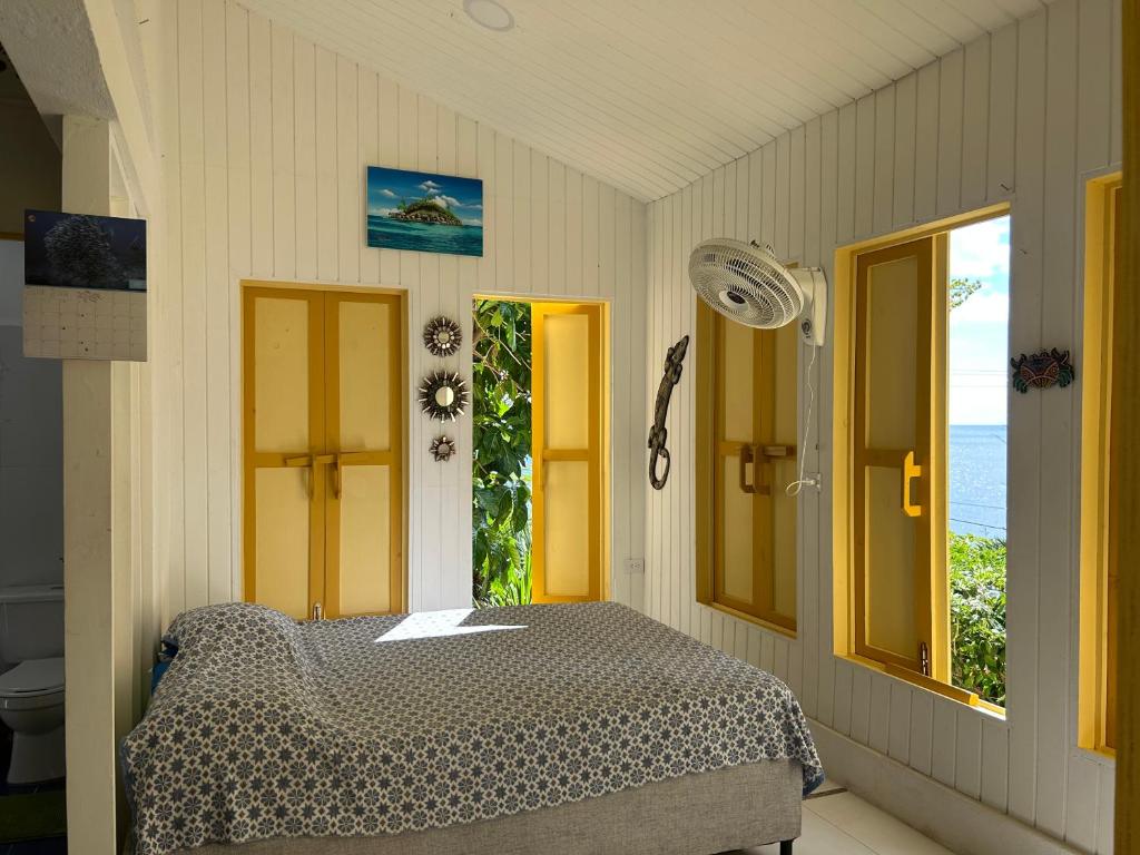 Ένα ή περισσότερα κρεβάτια σε δωμάτιο στο EcoLodge High Hill