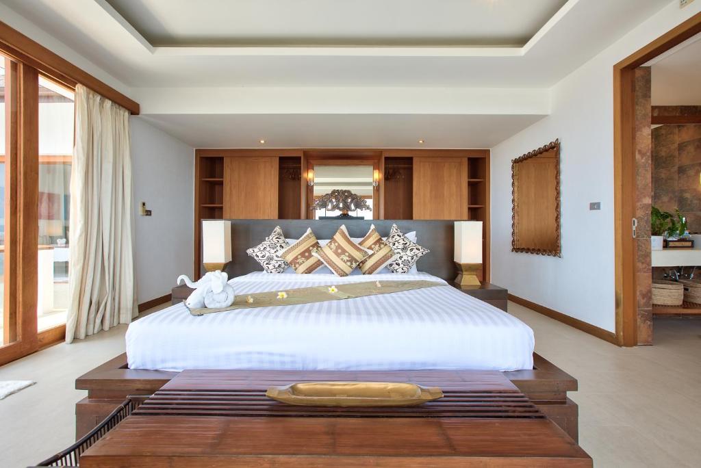 Ένα ή περισσότερα κρεβάτια σε δωμάτιο στο Ban Lealay