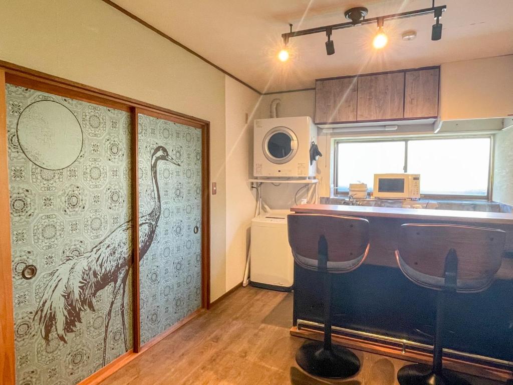 Η κουζίνα ή μικρή κουζίνα στο Usami Seaside