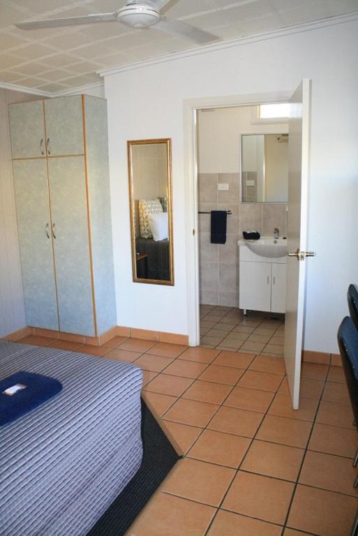 Kuchyň nebo kuchyňský kout v ubytování Central Motel Gin Gin