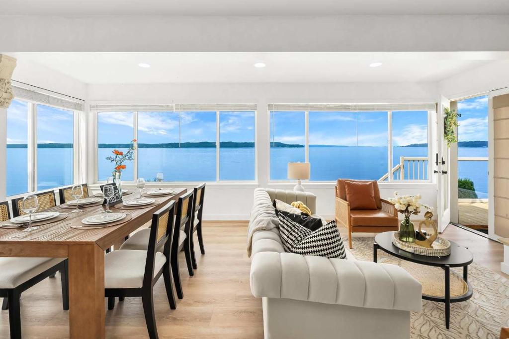 a dining room with a table and a view of the ocean at Water View Retreat Near Beach Park & City in Redondo