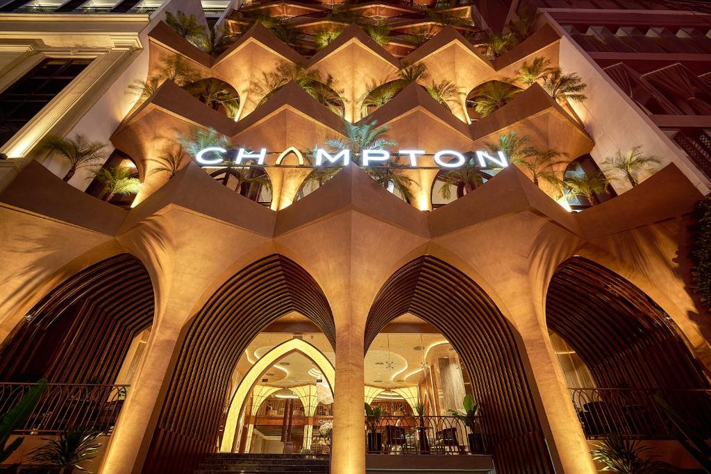 a shopping mall with a sign that reads champion at Champton Nha Trang Hotel in Nha Trang