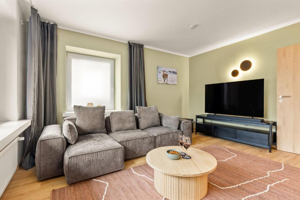 TV a/nebo společenská místnost v ubytování Ferienhaus am Skilift, Kinder & Familie willkommen