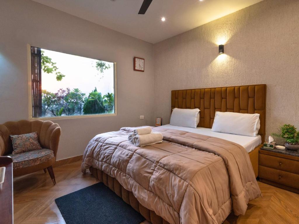 Ένα ή περισσότερα κρεβάτια σε δωμάτιο στο Hotel City Premier - Golf Course Road ,Gurgaon