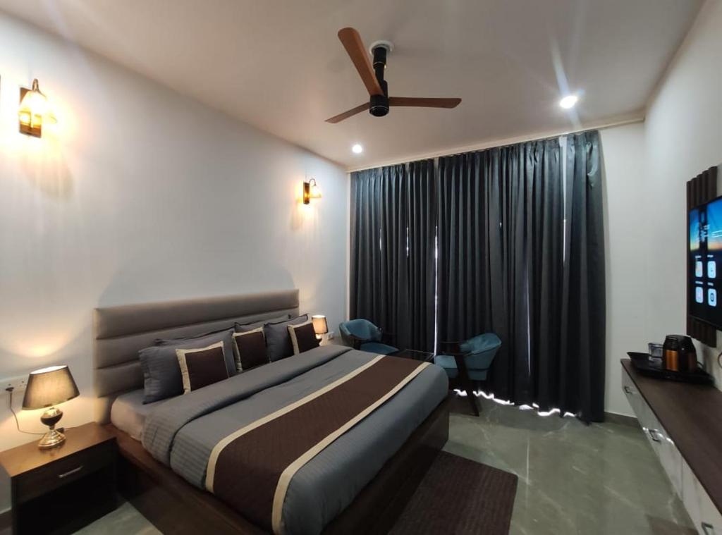 Postel nebo postele na pokoji v ubytování Maa Naina Restaurant