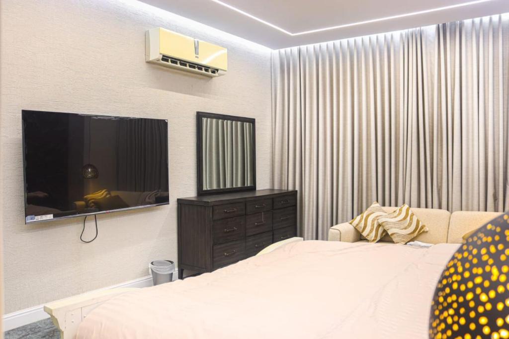 Μια τηλεόραση ή/και κέντρο ψυχαγωγίας στο احسان للشقق المفروشة